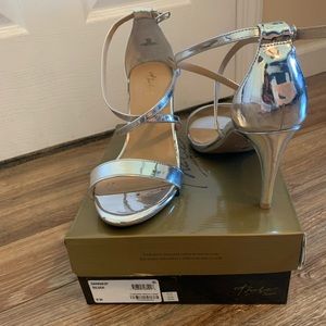 Strappy silver heels